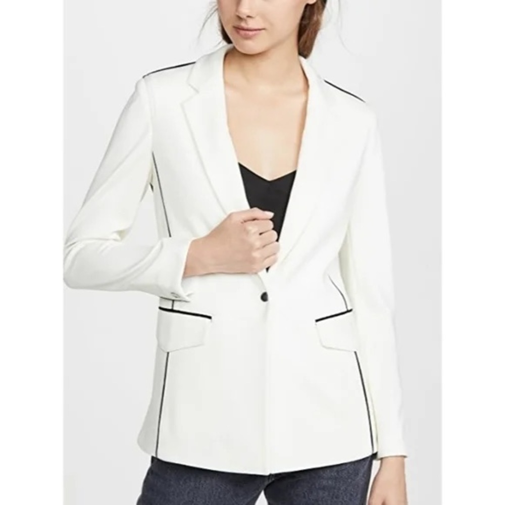 White blazer with black lining